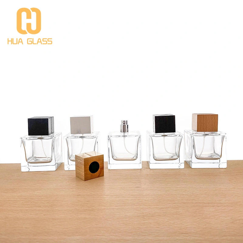 زجاجة عطر 100 مل بالجملة مع غطاء خشبي  