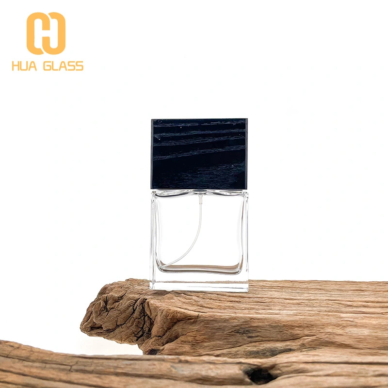 Frasco de perfume de vidrio negro de cubo cuadrado de 100 ml con tapa de madera negra  