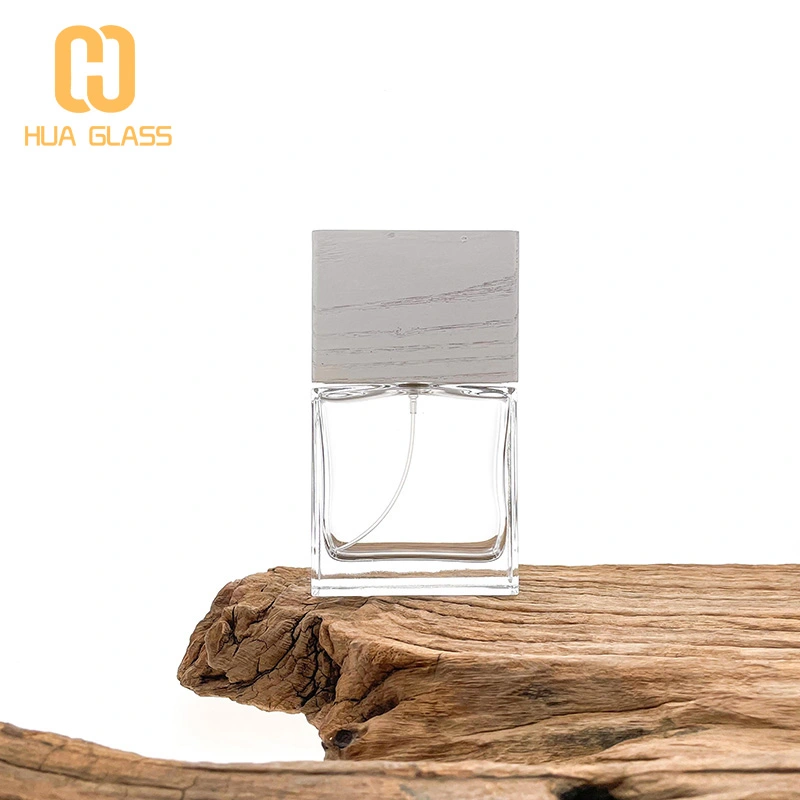 Frasco de perfume de vidrio negro de cubo cuadrado de 100 ml con tapa de madera negra  