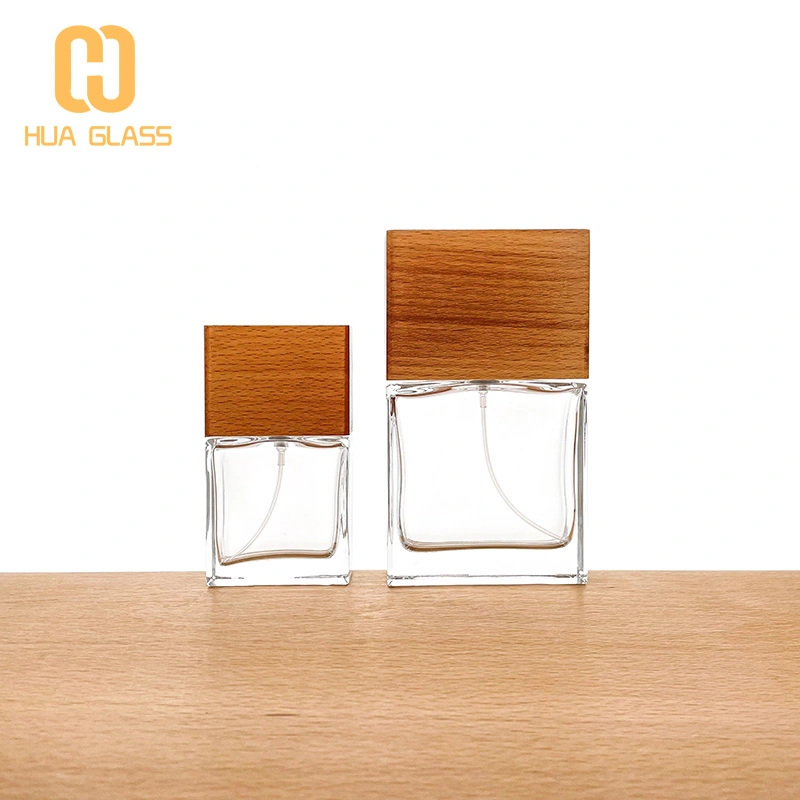 Frasco de perfume de vidrio negro de cubo cuadrado de 100 ml con tapa de madera negra  