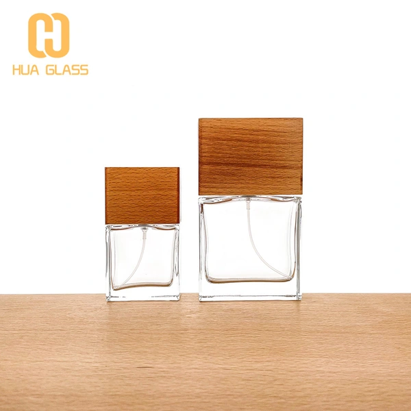 Frasco de perfume de vidrio negro de cubo cuadrado de 100 ml con tapa de madera negra
