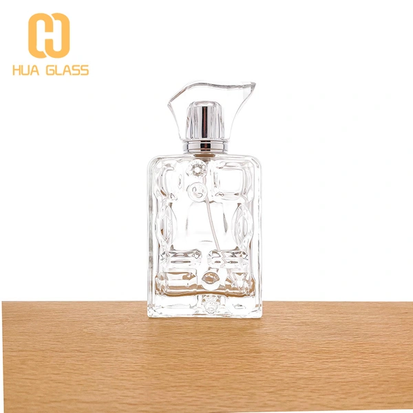 botella de perfume única en relieve botella de perfume de vidrio de 100 ml