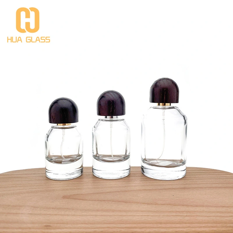 Tapa de madera personalizada 30ml 50ml 100ml botella de perfume de vidrio redonda cilíndrica  