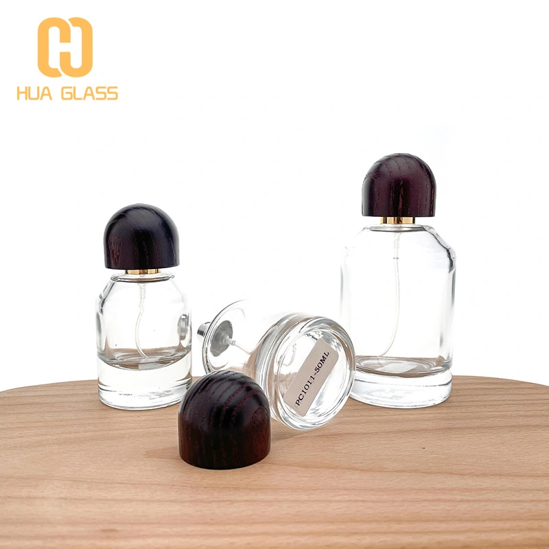 Tapa de madera personalizada 30ml 50ml 100ml botella de perfume de vidrio redonda cilíndrica  