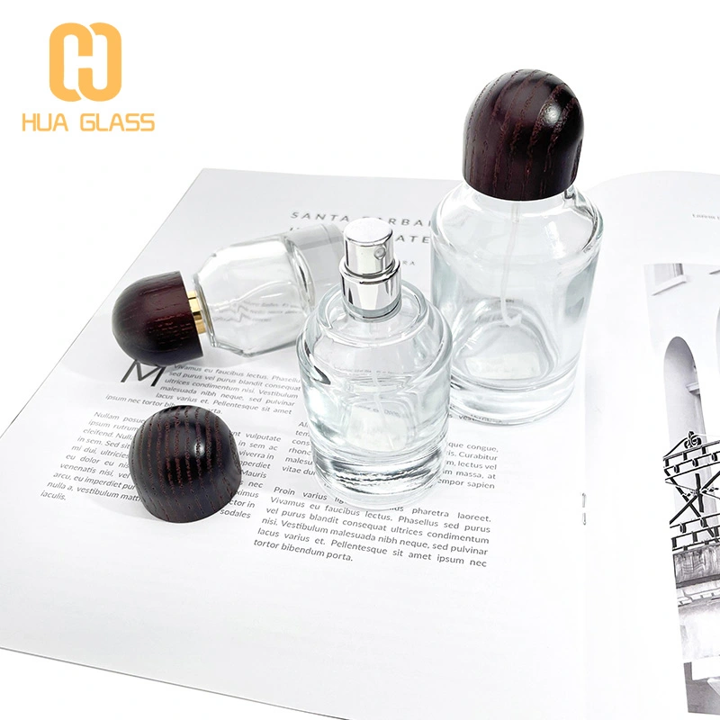 Tapa de madera personalizada 30ml 50ml 100ml botella de perfume de vidrio redonda cilíndrica  