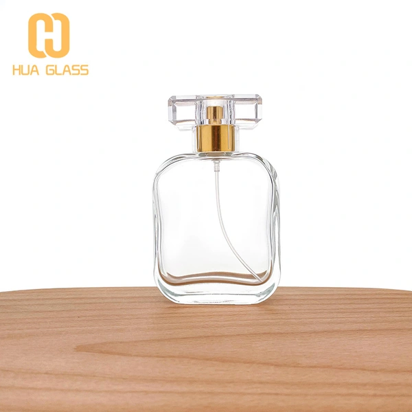 Flacon de parfum en verre à capuchon en cristal transparent de forme carrée ovale de 100 ml