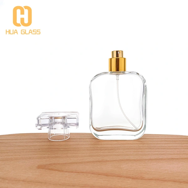 Flacon de parfum en verre à capuchon en cristal transparent de forme carrée ovale de 100 ml