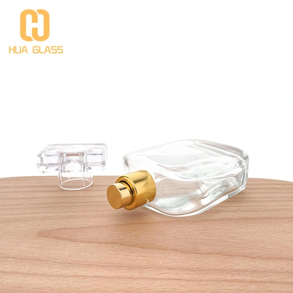 Flacon de parfum en verre à capuchon en cristal transparent de forme carrée ovale de 100 ml