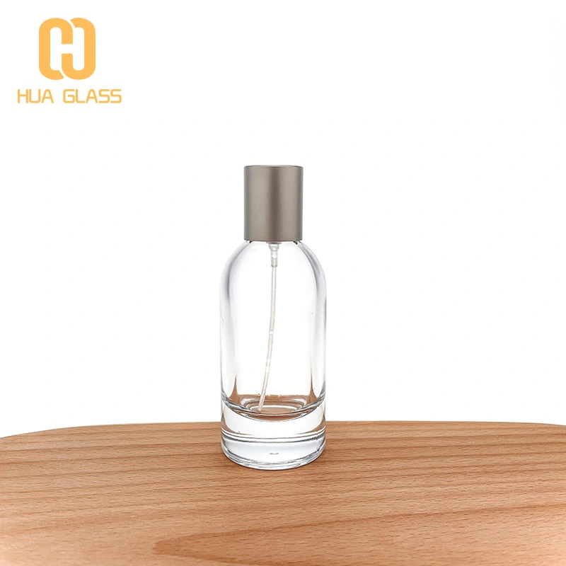 Flacon de parfum en verre de 100 ml avec pulvérisateur à pompe  