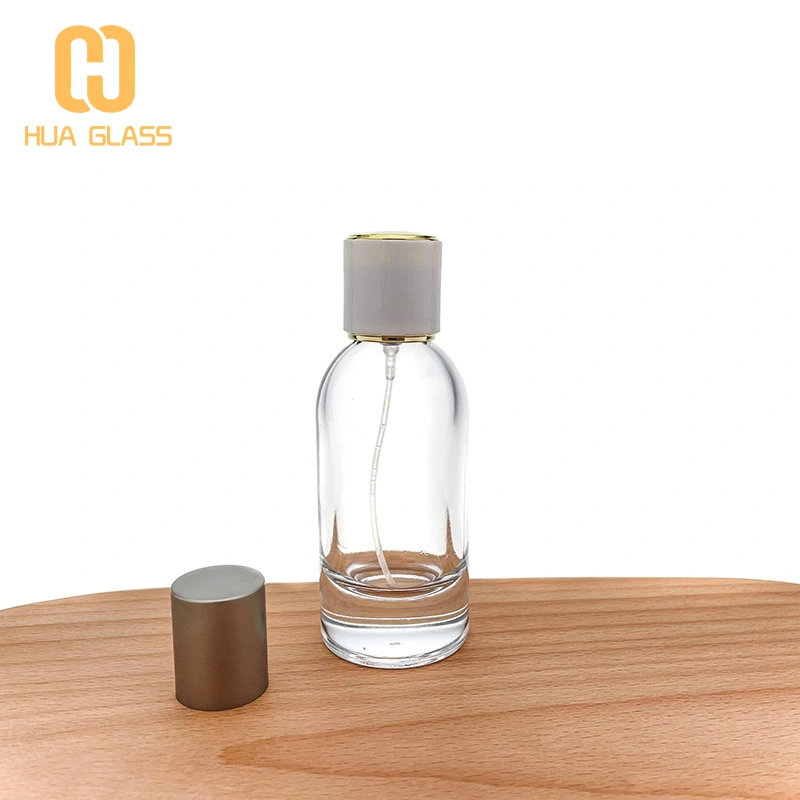 Flacon de parfum en verre de 100 ml avec pulvérisateur à pompe  