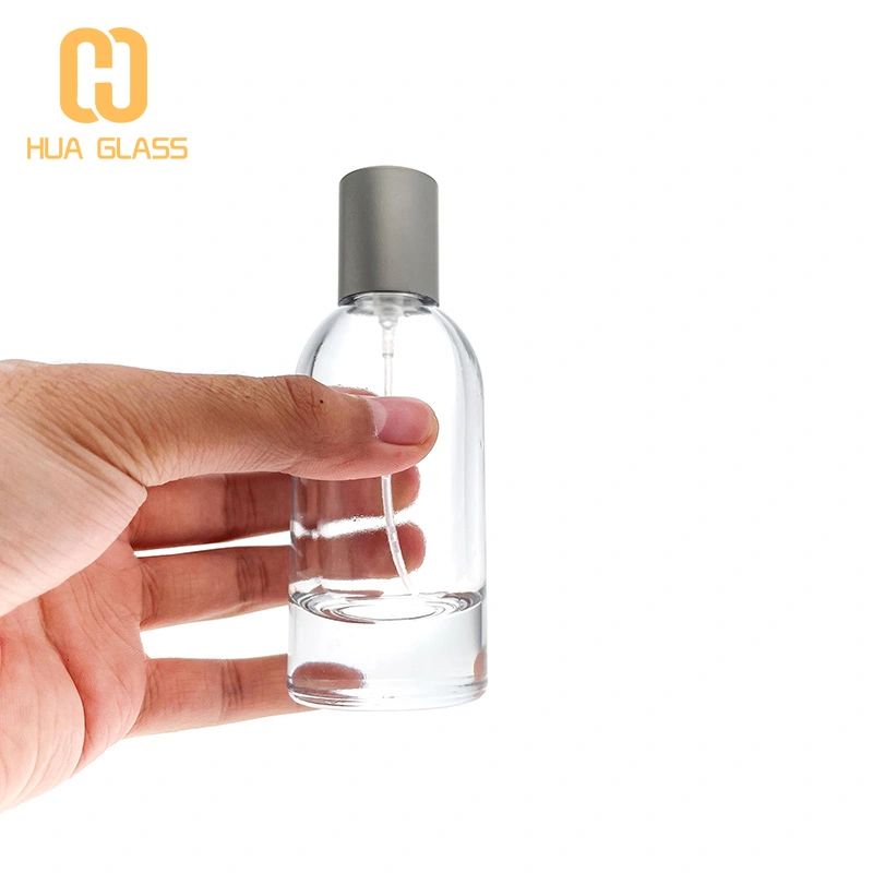 Flacon de parfum en verre de 100 ml avec pulvérisateur à pompe  