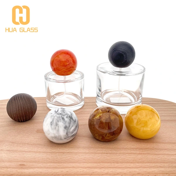 50 مل 100 مل زجاجة عطر زجاجية صغيرة مستديرة مع غطاء خشبي مستدير