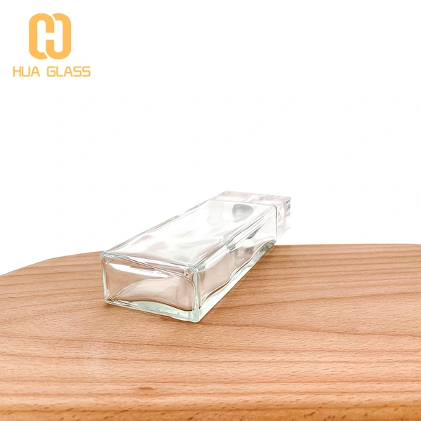 Botella de perfume de vidrio de diseño de cristal transparente transparente de 100 ml