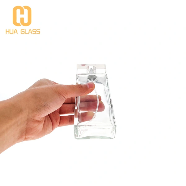 Botella de perfume de vidrio de diseño de cristal transparente transparente de 100 ml