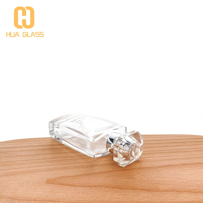 Botella de perfume con tapa de cristal de forma cuadrada plana de 50 ml