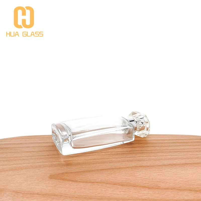 Botella de perfume con tapa de cristal de forma cuadrada plana de 50 ml