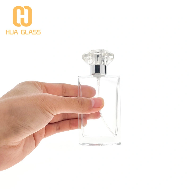 Botella de perfume con tapa de cristal de forma cuadrada plana de 50 ml