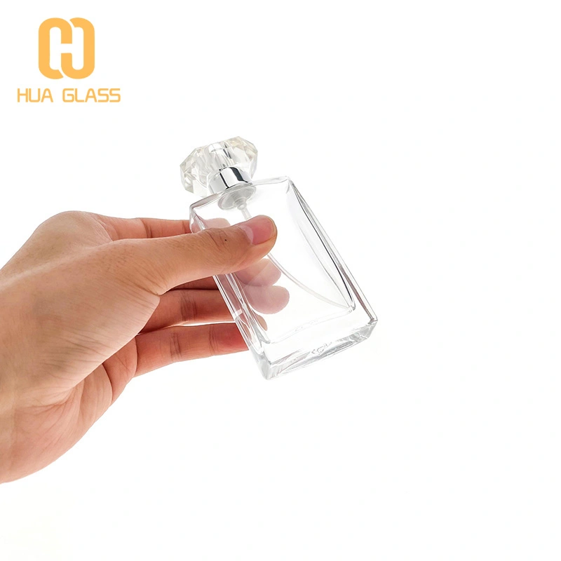 Botella de perfume con tapa de cristal de forma cuadrada plana de 50 ml