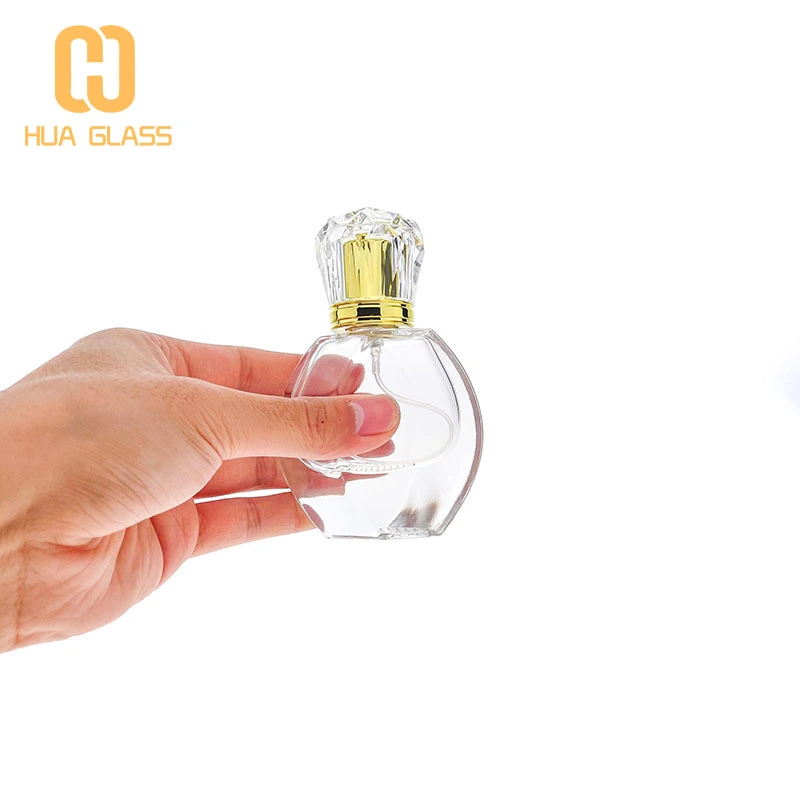Botellas de perfume de vidrio redondas Botellas de perfume vacías de 50 ml a la venta