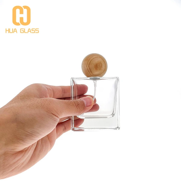 Frasco de perfume de vidrio cuadrado de 30 ml, 50 ml, 100 ml con tapa redonda de madera