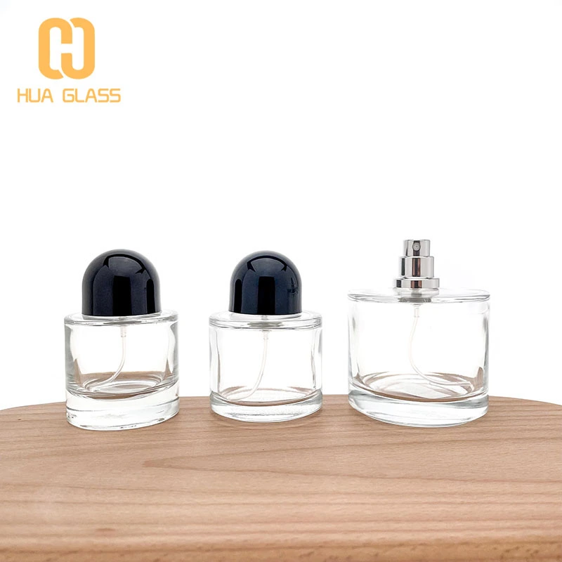 bouteille de parfum ronde 50ml 100ml bouteilles de parfum personnalisées avec bouchon noir  