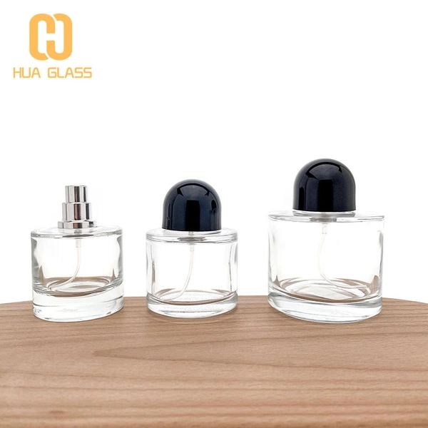 bouteille de parfum ronde 50ml 100ml bouteilles de parfum personnalisées avec bouchon noir