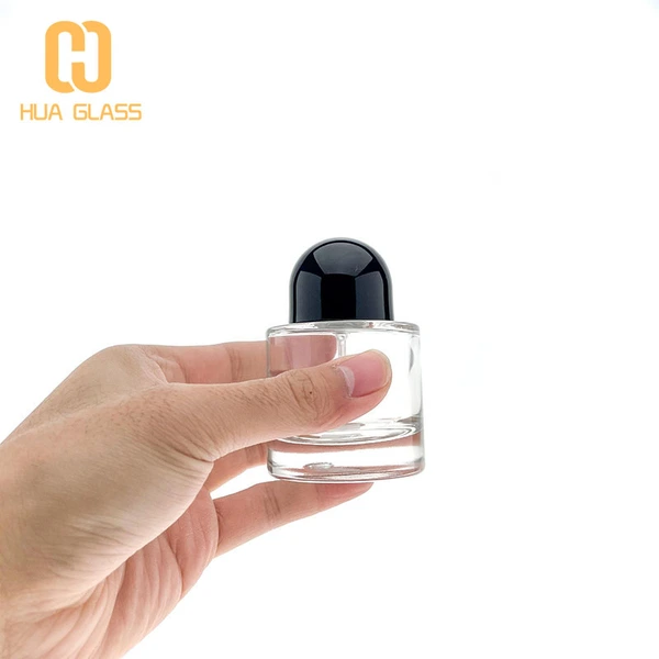 bouteille de parfum ronde 50ml 100ml bouteilles de parfum personnalisées avec bouchon noir