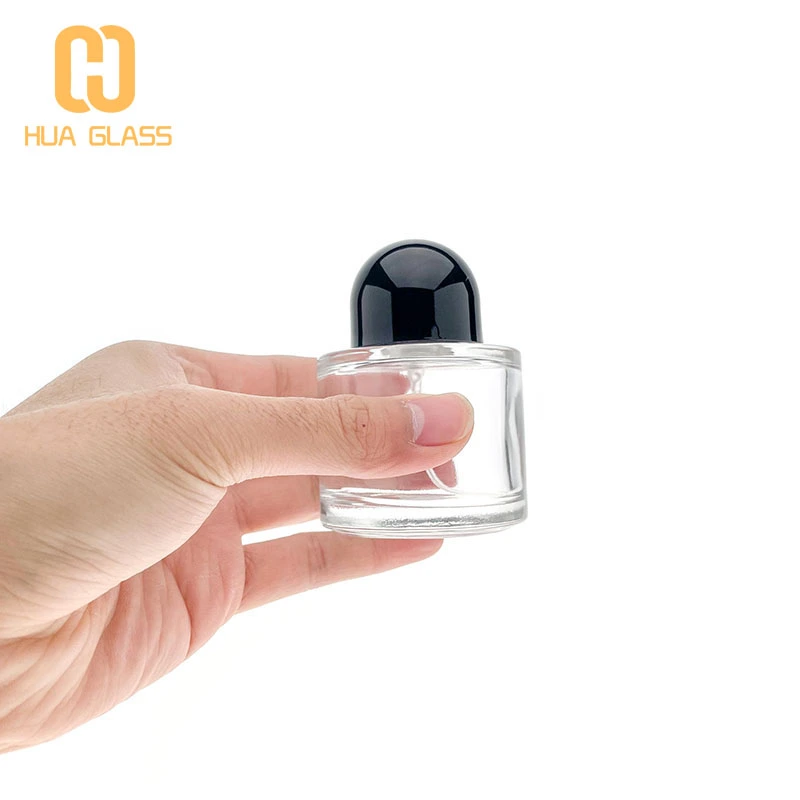 bouteille de parfum ronde 50ml 100ml bouteilles de parfum personnalisées avec bouchon noir  