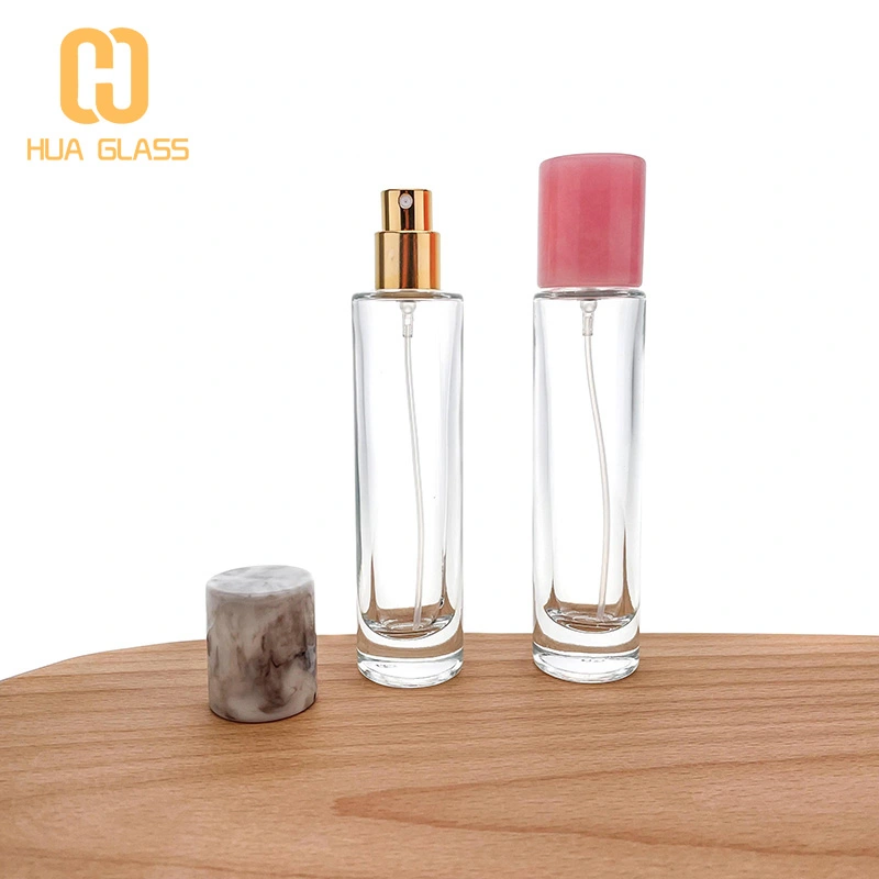 Frasco de perfume cilíndrico de 30 ml con tapa de mármol gris rosa  