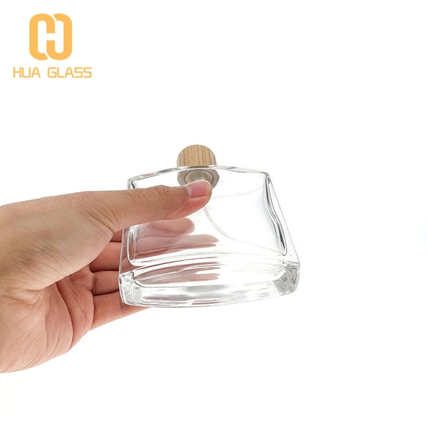 Botella de perfume de vidrio cuadrada de fondo redondo de 50ml y 100ml al por mayor