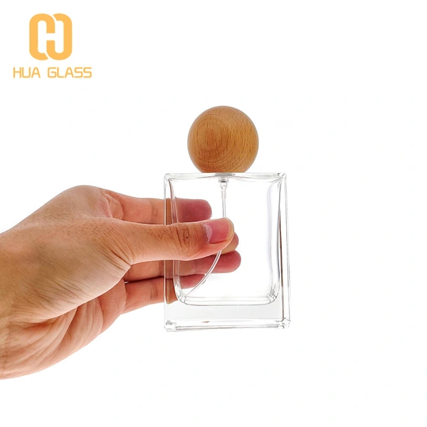 زجاجة عطر مربعة من الزجاج الشفاف بسعة 100 مل مع مضخة