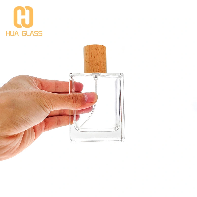 زجاجة عطر مربعة من الزجاج الشفاف بسعة 100 مل مع مضخة
