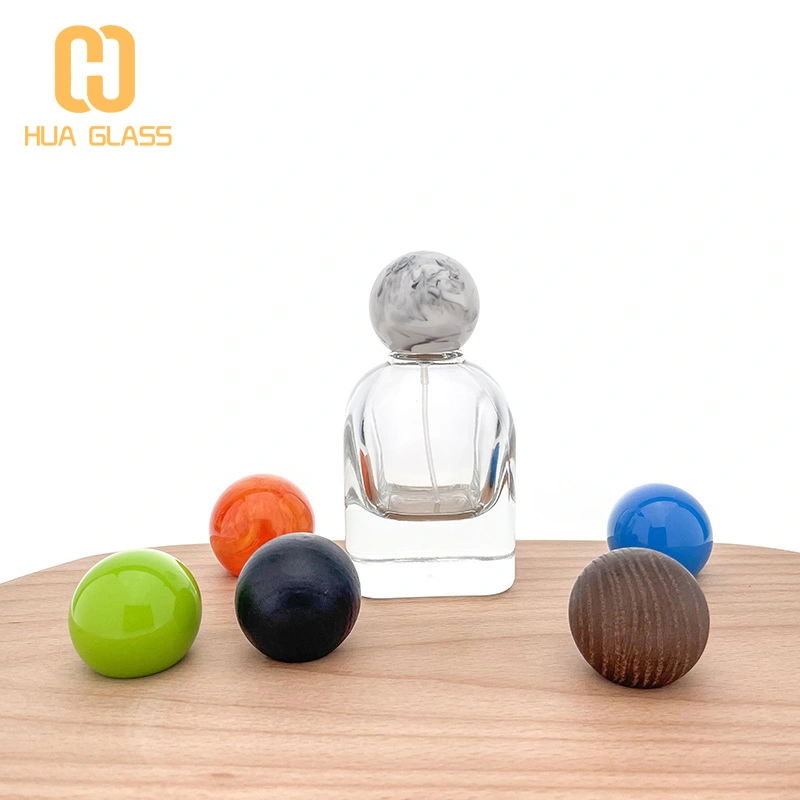 Botella de perfume de vidrio vacía personalizada de 80 ml con tapa de bola de resina  