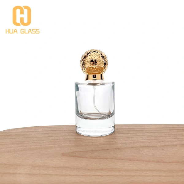 Flacon de parfum en verre rond de 50 ml avec bouchon en zamak  