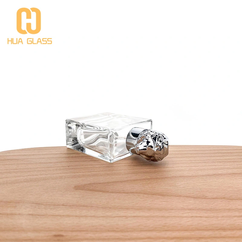 50 مل زجاجة عطر بغطاء زاماك زجاجي مربع مع غطاء زاماك على شكل أسد  