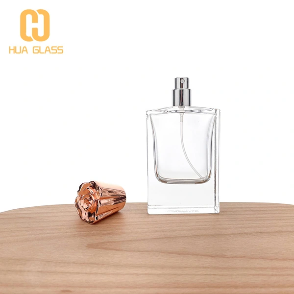 Botella de perfume con tapa de zamak de oro rosa de vidrio pulido a mano rectangular de 50 ml