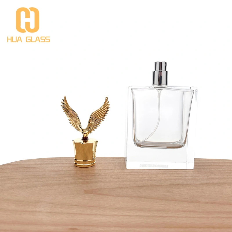 Frasco de perfume con tapa de zamak en forma de águila de vidrio pulido a mano cuadrado de 100 ml  