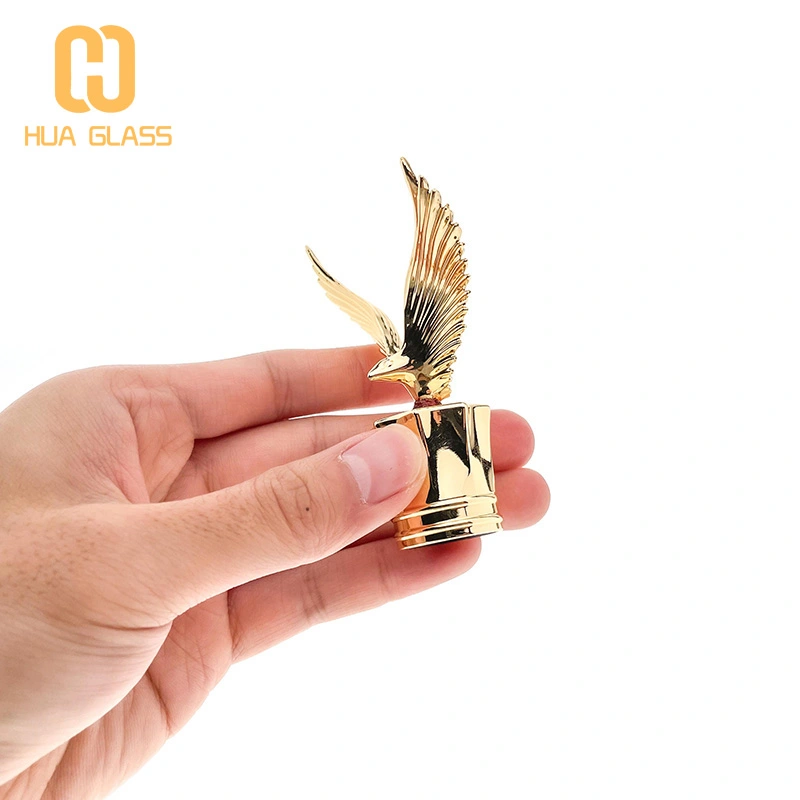 Frasco de perfume con tapa de zamak en forma de águila de vidrio pulido a mano cuadrado de 100 ml  