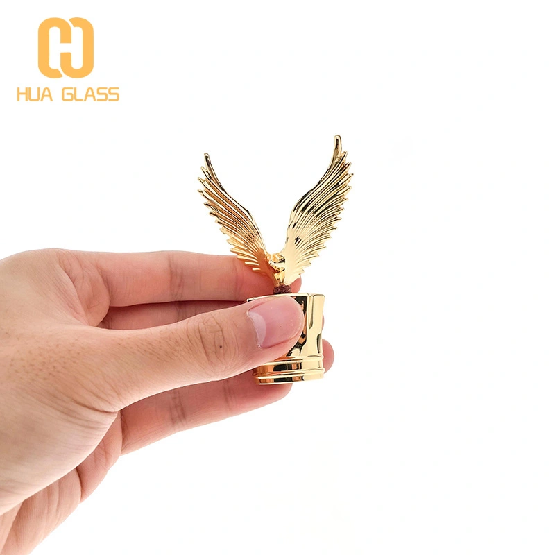 Frasco de perfume con tapa de zamak en forma de águila de vidrio pulido a mano cuadrado de 100 ml  