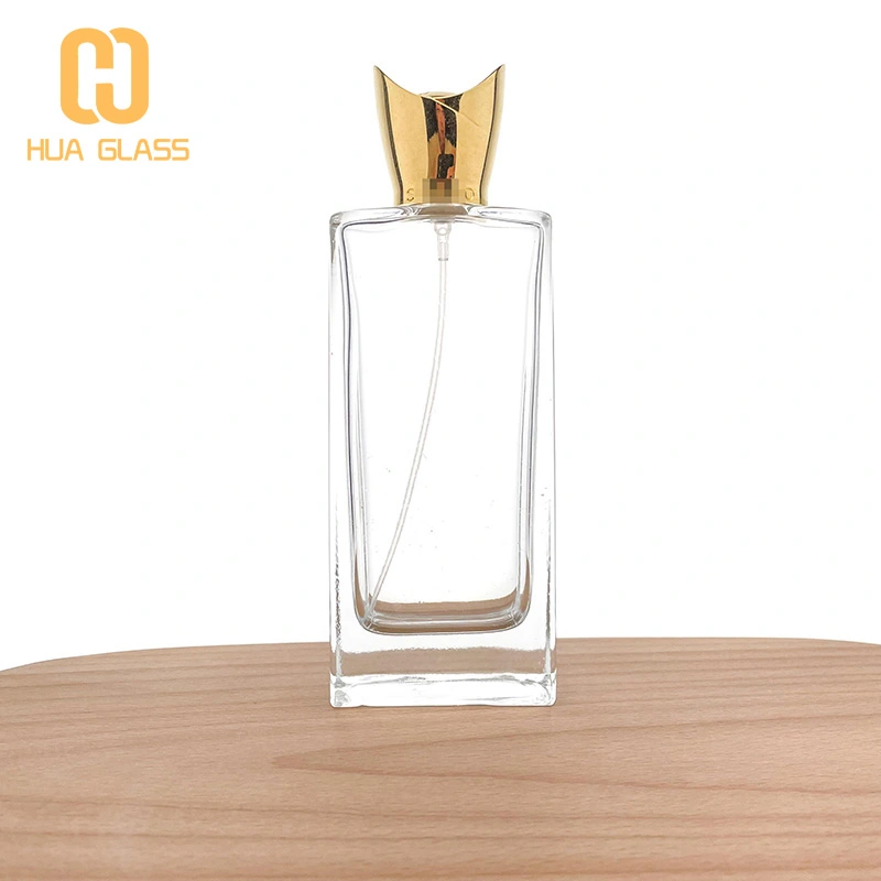 botella de perfume personalizada botella de perfume de vidrio en aerosol de 100 ml con tapa de zamak  