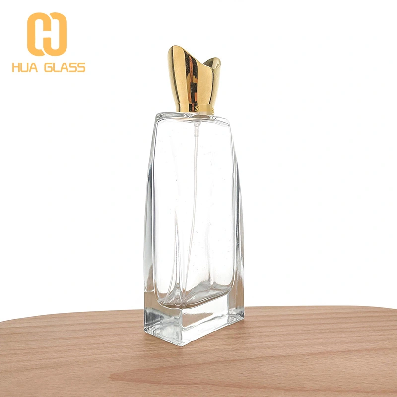 botella de perfume personalizada botella de perfume de vidrio en aerosol de 100 ml con tapa de zamak  