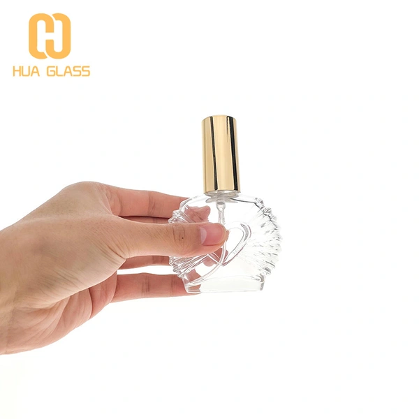 Botella de perfume única de 100 ml con bomba