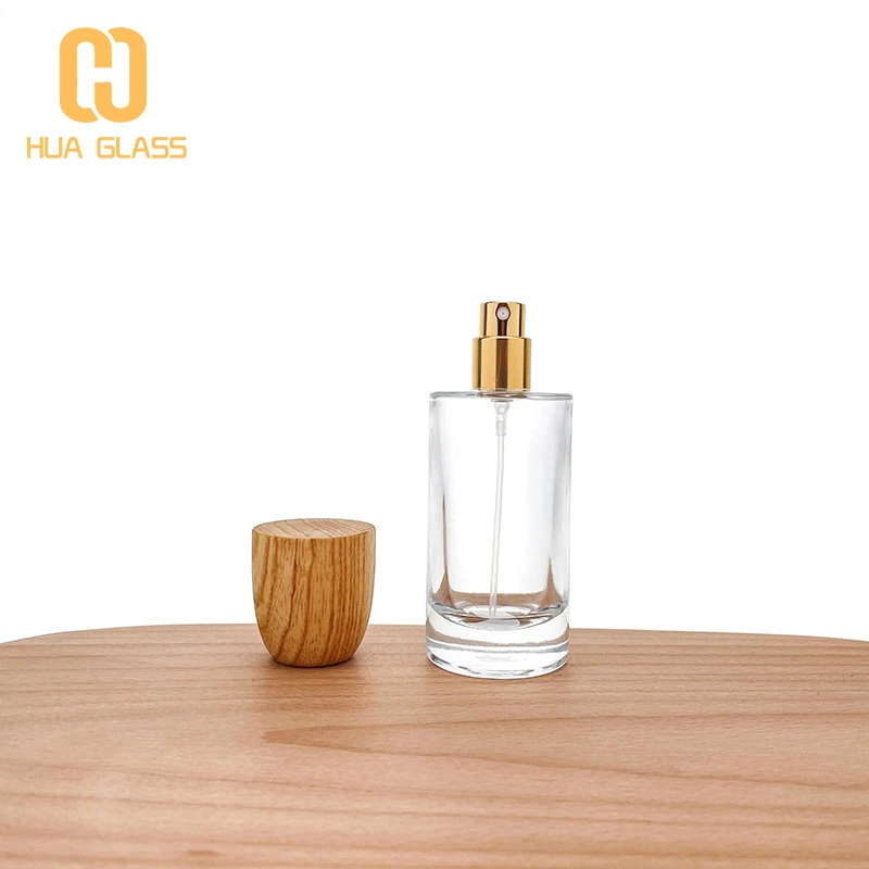 Tapa de madera personalizada 50ml 100ml botella de perfume de vidrio redonda cilíndrica  