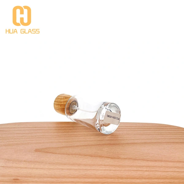 Tapa de madera personalizada 50ml 100ml botella de perfume de vidrio redonda cilíndrica