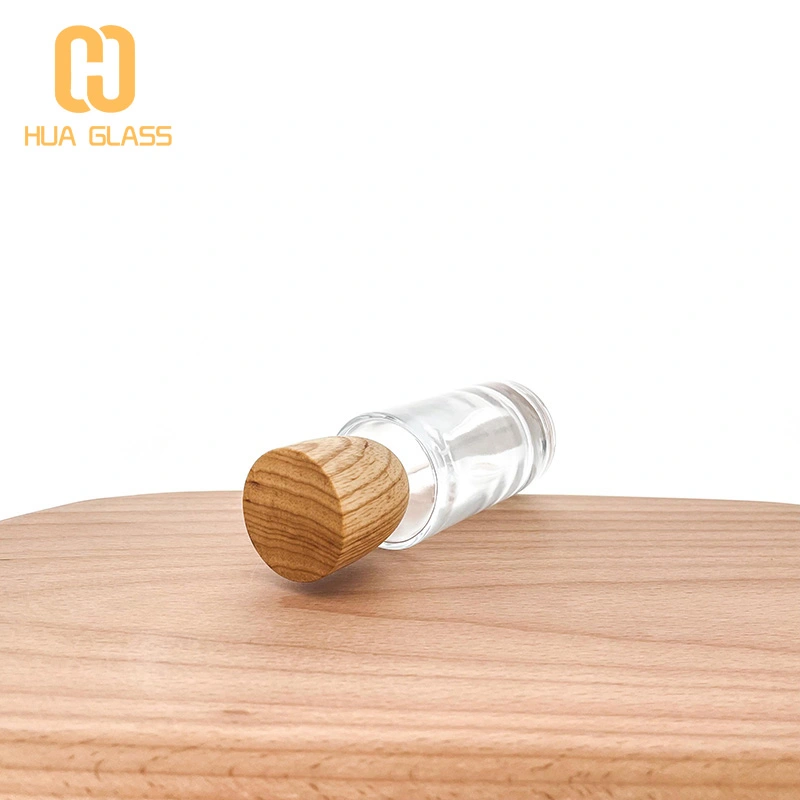 Tapa de madera personalizada 50ml 100ml botella de perfume de vidrio redonda cilíndrica  