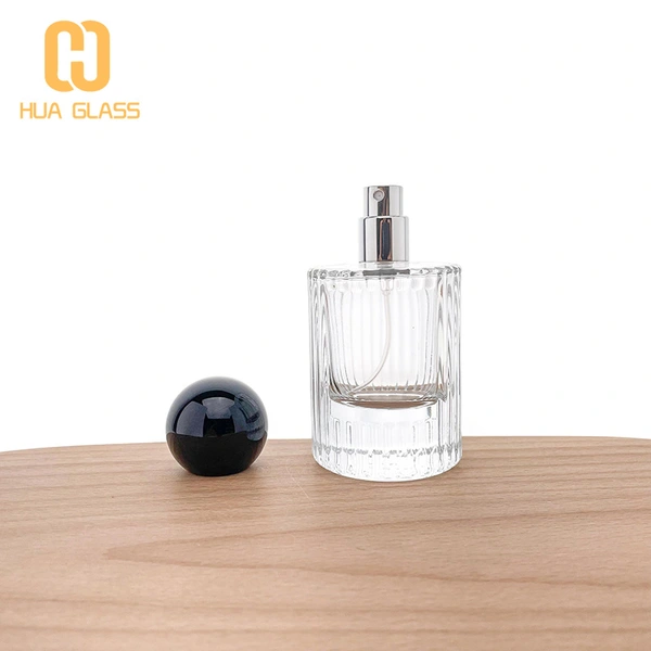 2022 nuevo diseño botella de perfume de vidrio cilíndrico de 50 ml con tapa de bola