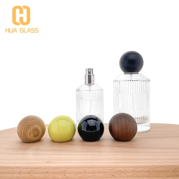 Botella de perfume redonda de cilindro de vidrio de pendiente vacía al por mayor