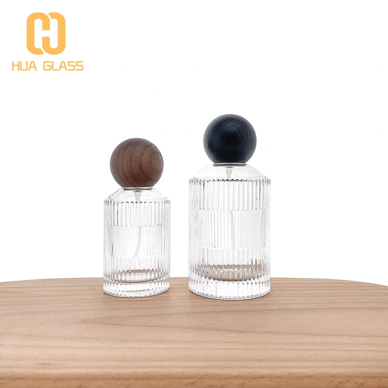 Botella de perfume redonda de cilindro de vidrio de pendiente vacía al por mayor