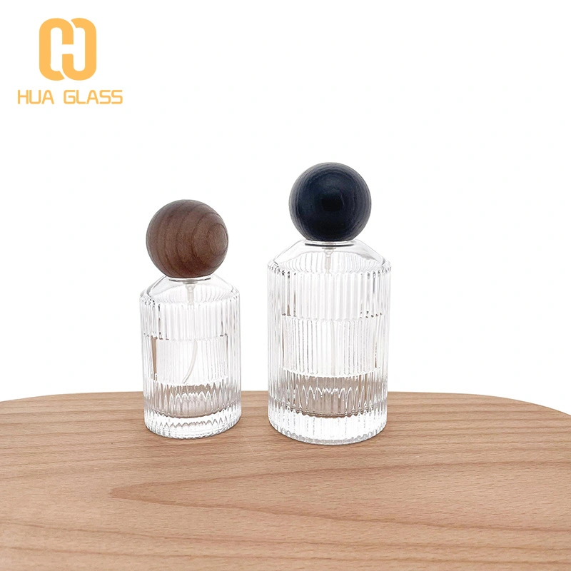 Botella de perfume redonda de cilindro de vidrio de pendiente vacía al por mayor