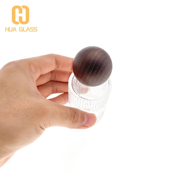 Botella de perfume redonda de cilindro de vidrio de pendiente vacía al por mayor